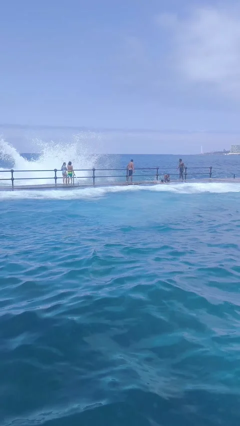Waves explode against Bajamar natural pools. Stock Footage 329188586