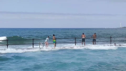 Waves explode against Bajamar natural pools. Stock Footage 329188623