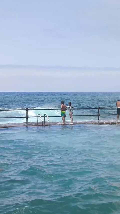 Waves explode against Bajamar natural pools. Stock Footage 329188687