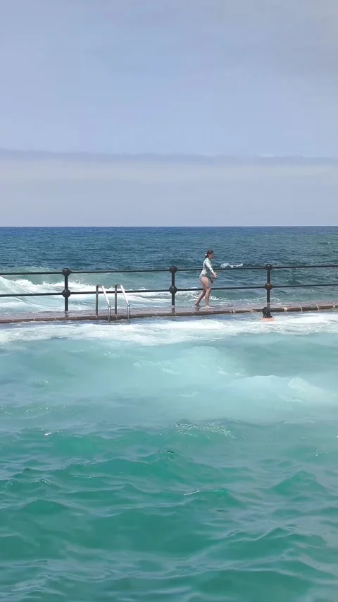 Waves explode against Bajamar natural pools. Stock Footage 329188754