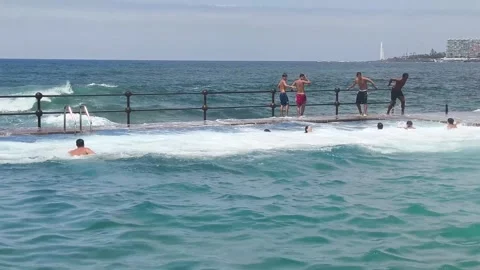 Waves explode against Bajamar natural pools. Stock Footage 329188783