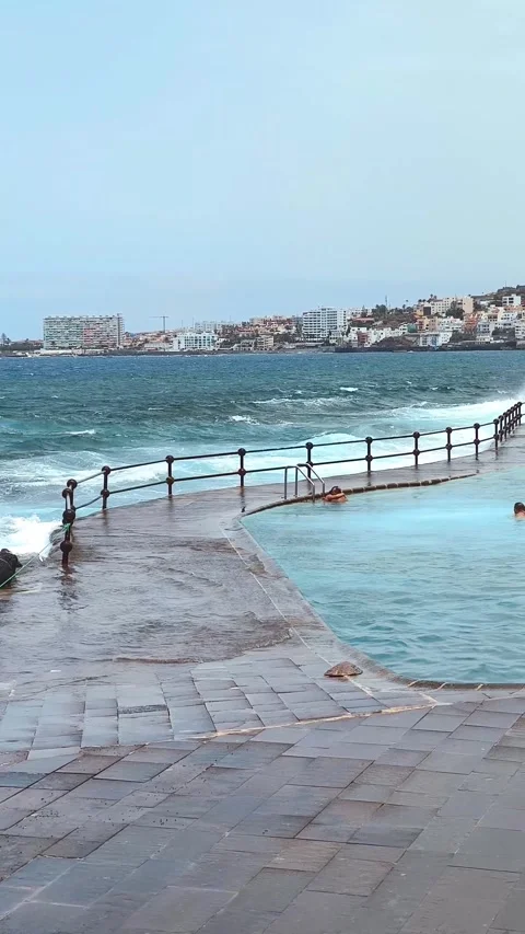 Waves explode against Bajamar natural pools. Stock Footage 329247068