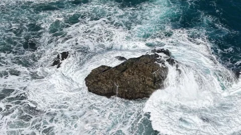 Waves exploding on rock in sea white water crashes drone,aerial view Stock Footage 331057119