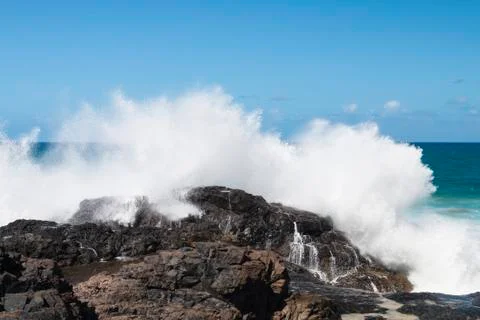 Waves exploding towards the camera at the northern coast of Jandia in Fuertev Stock Photos