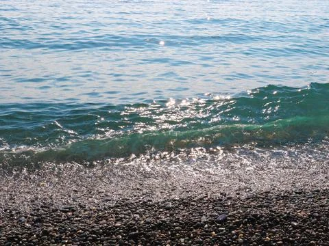 Waves fall on the beach Stock Photos