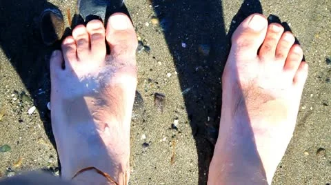 Waves on feet Stock Footage 10743490