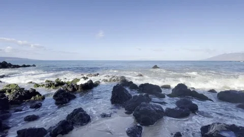 Waves filter through tide pools on beach in Hawaii Stock Footage 186881794