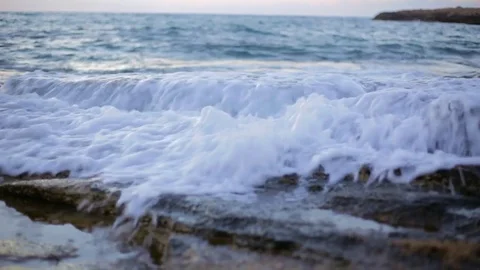 Waves on flat rocks Stock Footage 79218995