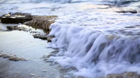 Waves on flat rocks Stock Footage 79219087