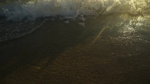 Waves floating on the beach Stock Footage 212964358