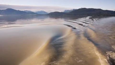 Waves in flood water Stock Photos