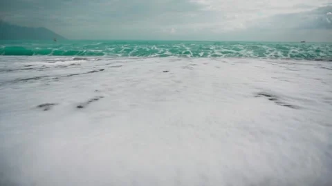 Waves Flowing Back and Forth on the Black Sand Beach at Qixingtan, Hualien Stock Footage 342067701
