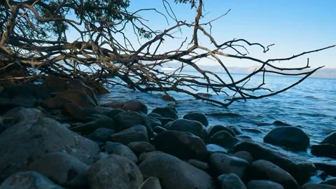 Waves flowing Over Rocks At Lake Tahoe Stock Footage 302599071