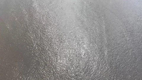 Waves flowing on sandy beach surface Stock Footage 295567589