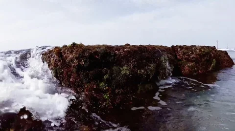 Waves flowing through a Coral reef ,serf with underwater air bubble Stock Footage 113687792