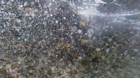 Waves flowing through a Coral reef ,serf with underwater air bubble Stock Footage 113687816