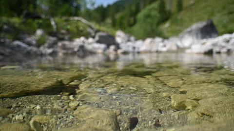 Waves of flowing water from a mountain stream (slow motion) Video stock 260844868