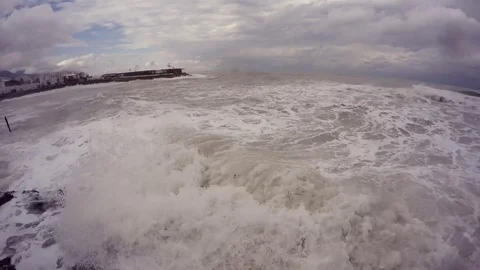 Waves With Foam and Splashes Bump in Camera Mediterranean Sea Far Town Stock Footage 74459237