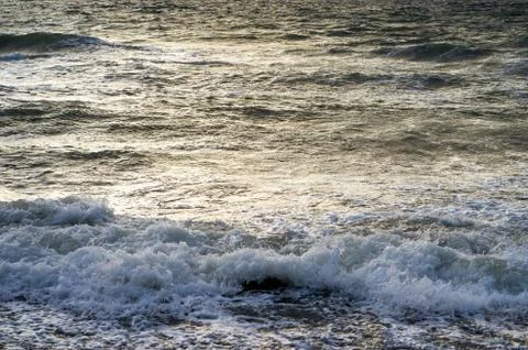 Waves of foam spray Stock Photos