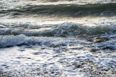 Waves of foam spray Stock Photos