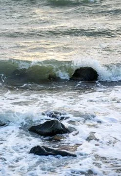 Waves of foam spray Stock Photos