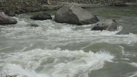 Waves, foam, spray in the stream of the Katun River Stock Footage 76341078