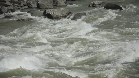 Waves, foam, spray in the stream of the Katun River Stock Footage 76763758