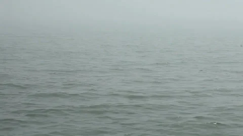 Waves in fog Stock Footage 26182595