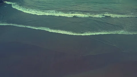 Waves folding and touching the shores of Baron beach aerial view, Indonesia Stock Footage 91879449