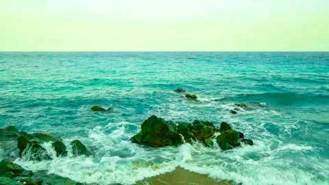 Waves forming along the beach. Video stock 145345918