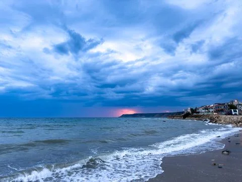 Waves in the front and redness in the back Stock Photos