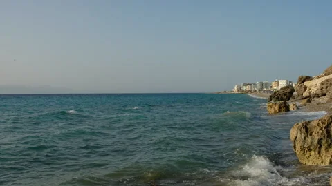 Waves in front of the Rhodes city Stock Footage 278289646
