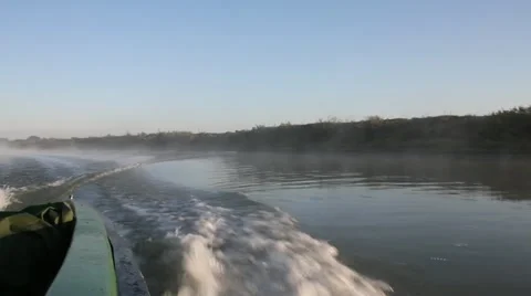 Waves generated by motor boat sailing on water Video stock 12517982