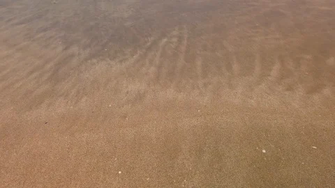 Waves gently breaking on a pristine beach Stock-Footage 123764269