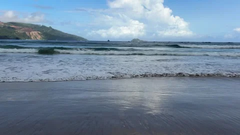 Waves Gently Breaking on a Sandy Beach Stock Footage 311353973