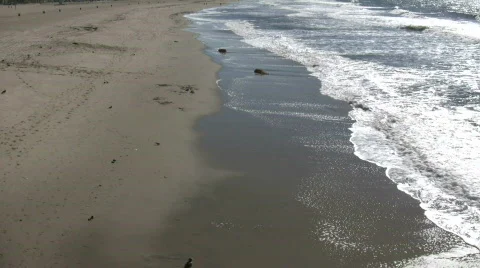 Waves gently flow over shore in beach scenic (High Definition) Stock Footage 358814