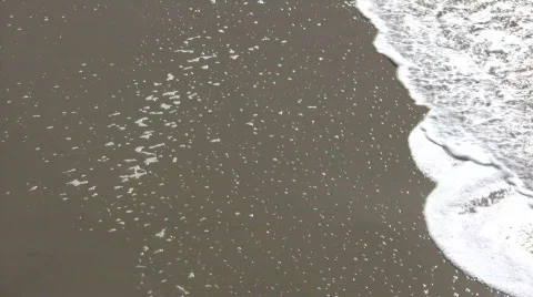 Waves gently flow over shore in beach scenic (High Definition) Video stock 358815