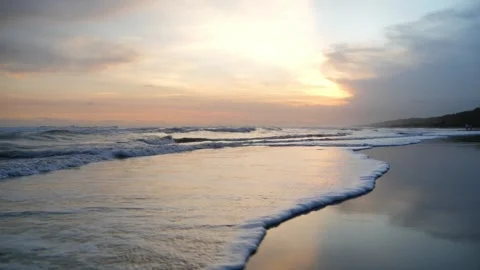 Waves gently roll sunset3 Stock Footage 337990430