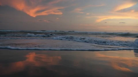 Waves gently roll sunset4 Stock Footage 337989670
