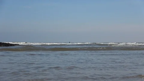 Waves gently rolling into beach Stock-Footage 86318467