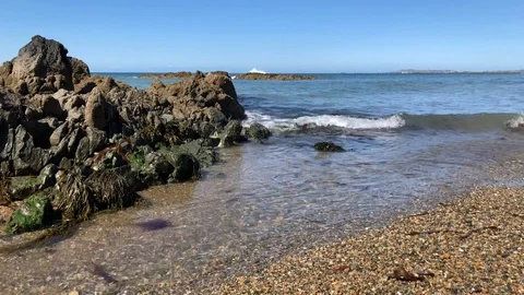 Waves gently rolling onto the beach Stock Footage 101437958