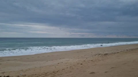 Waves Gently Washing Sandy Beach Under Cloudy Blue Sky Horizon Stock Footage 320253737