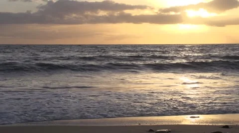 Waves on The Golden Beach At Sunset Stock Footage 49743197