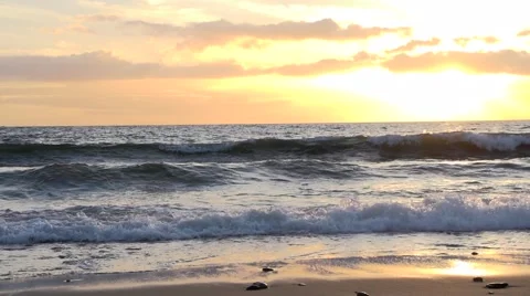 Waves on The Golden Beach At Sunset Slow Motion Stock Footage 49740224