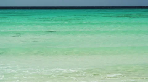 Waves from the Green-Blue Ocean to the Beach Video stock 52234358