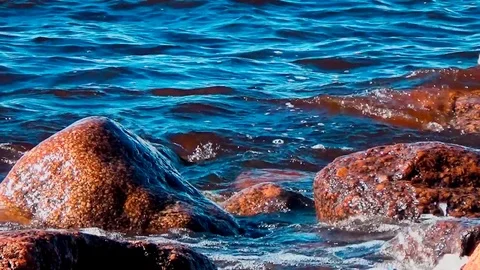 The waves of the gulf are broken on the shore stones Stock Footage 75203973