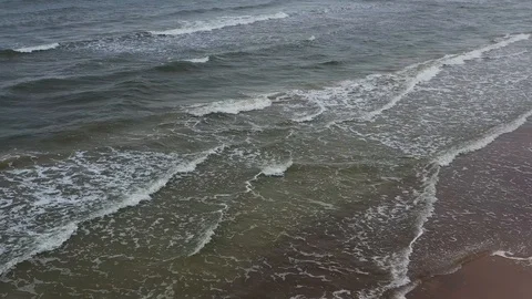 Waves hit the beach and slowly fades away Stock Footage 116493180