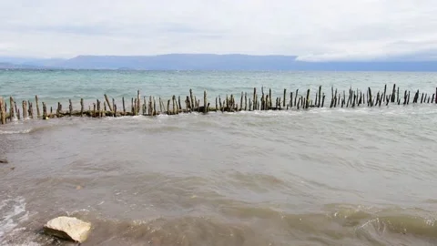 Waves hit hard on the shore. Stock Footage 163764012