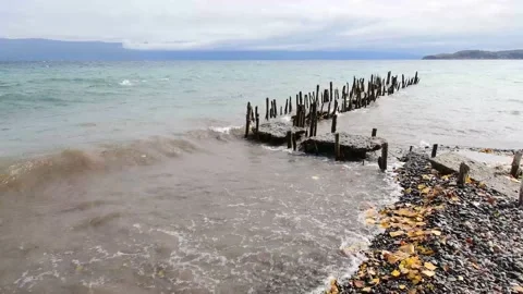 Waves hit hard on the shore. Stock Footage 163913598