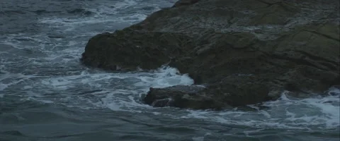 Waves hit rock, 3K, Anamorphic, Red One Stock Footage 46028503